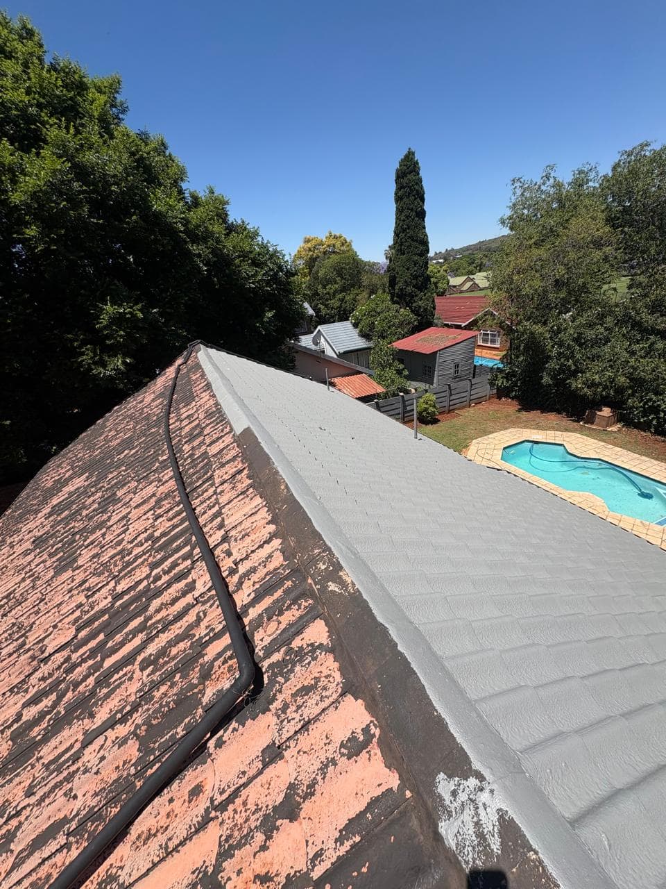 Exterior roof coating, before and after
